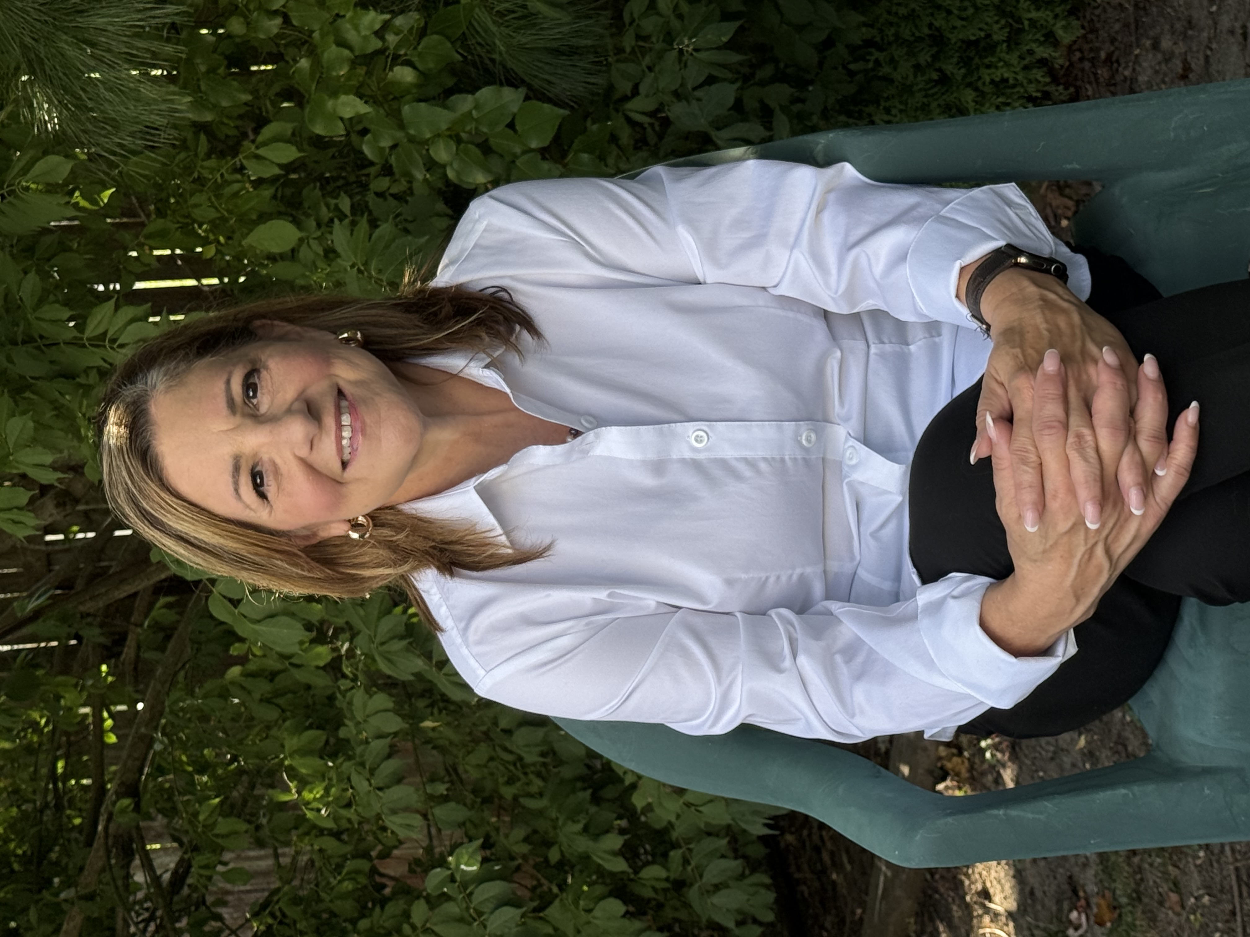 Lisa Bennett seated.